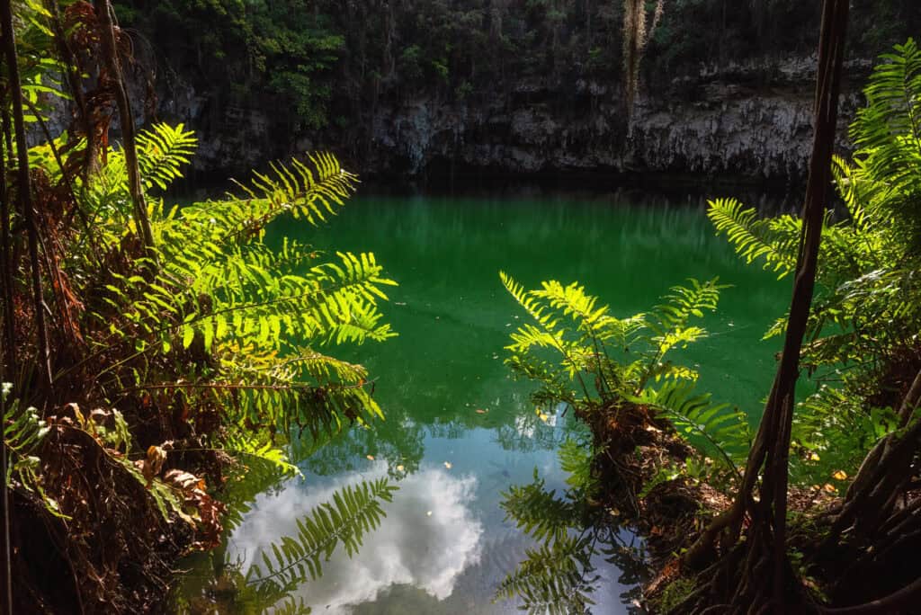 Turquoise cenote lagoon at Los Tres Ojos National Park, Santo Domingo
